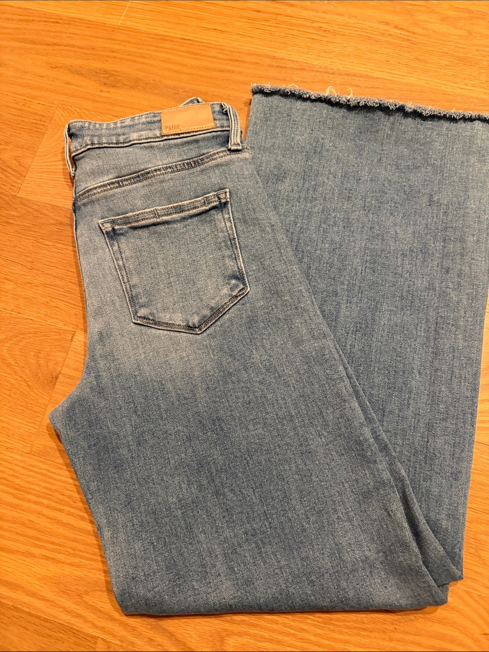 PAIGE Anessa Light Blue Wide Leg Jeans with Raw Hem